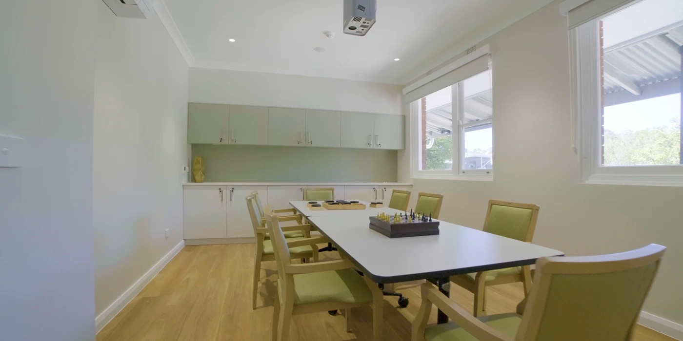 dining area with a sleek dining chair and a stylish table