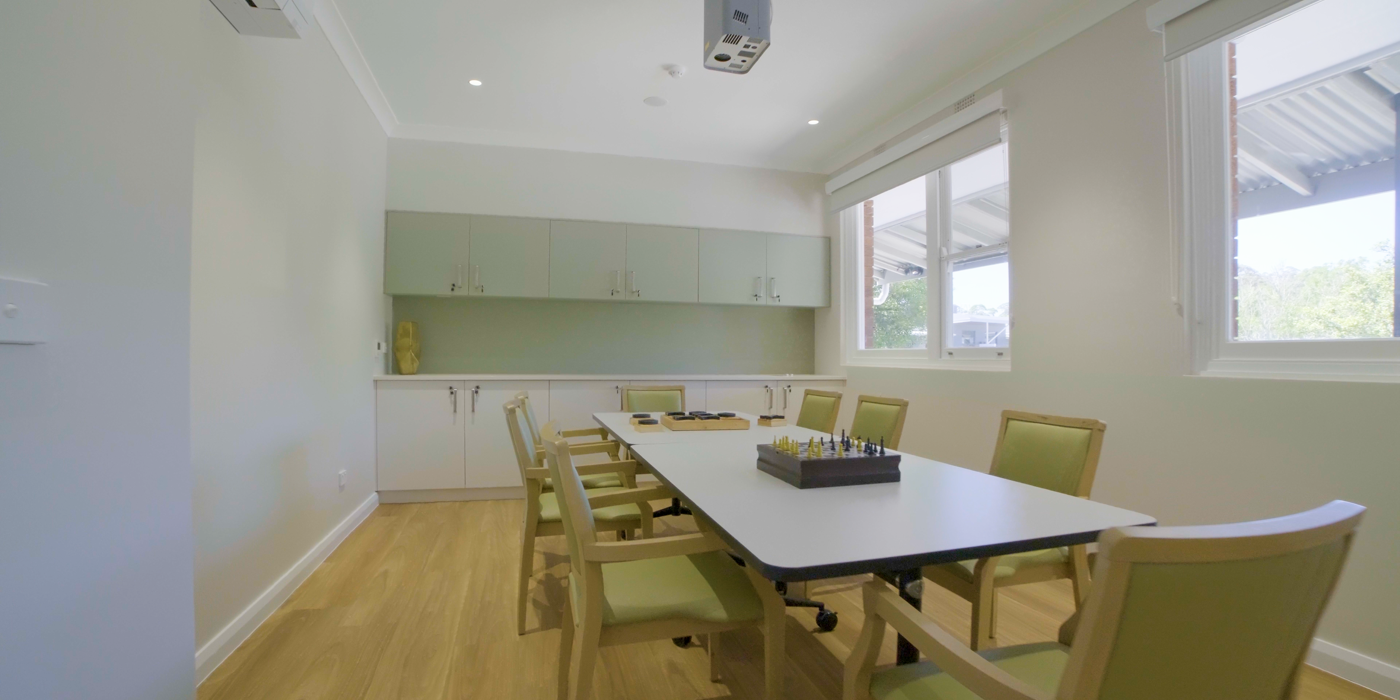 dining area with a sleek dining chair and a stylish table